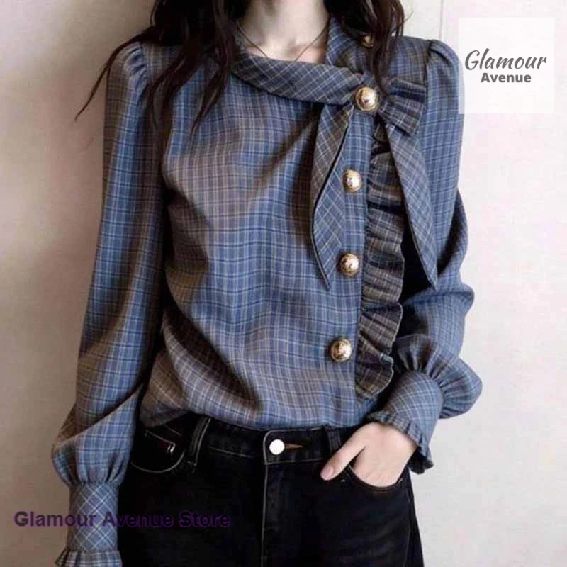 

French retro high-quality bow plaid long-sleeved shirt women's spring and autumn new fashion temperament casual Joker top.