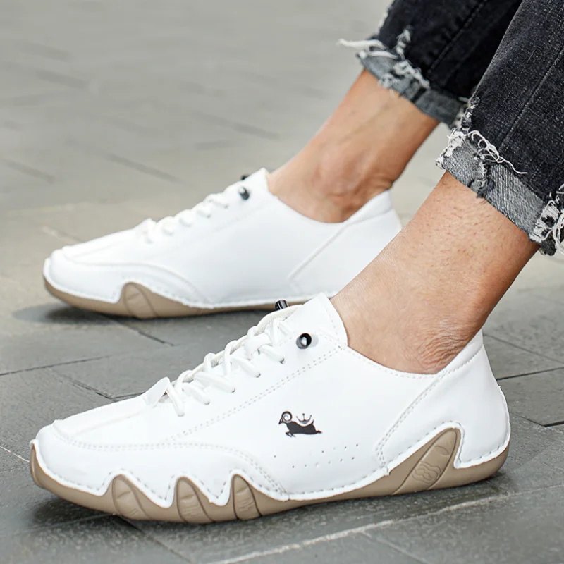 Zapatillas deportivas de cuero para hombre, zapatos informales a la moda para caminar, Calzado cómodo de lujo, novedad de 2023