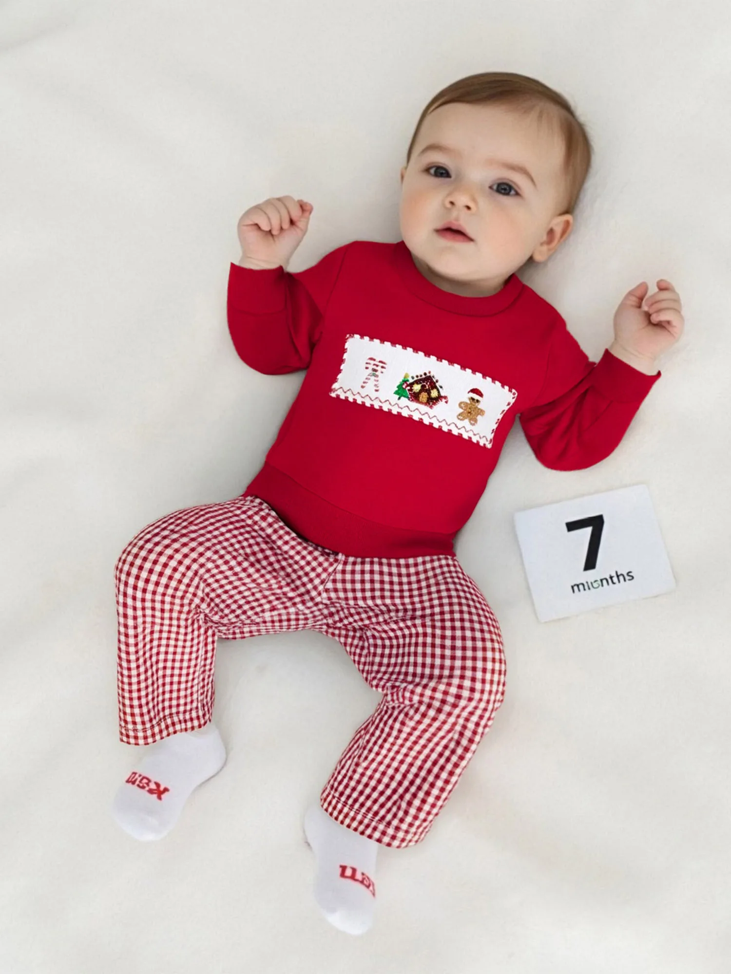 

Infant Christmas Reindeer Romper and Hat Set with Snowflake Print and Pom Pom Detail for Holiday Festivities