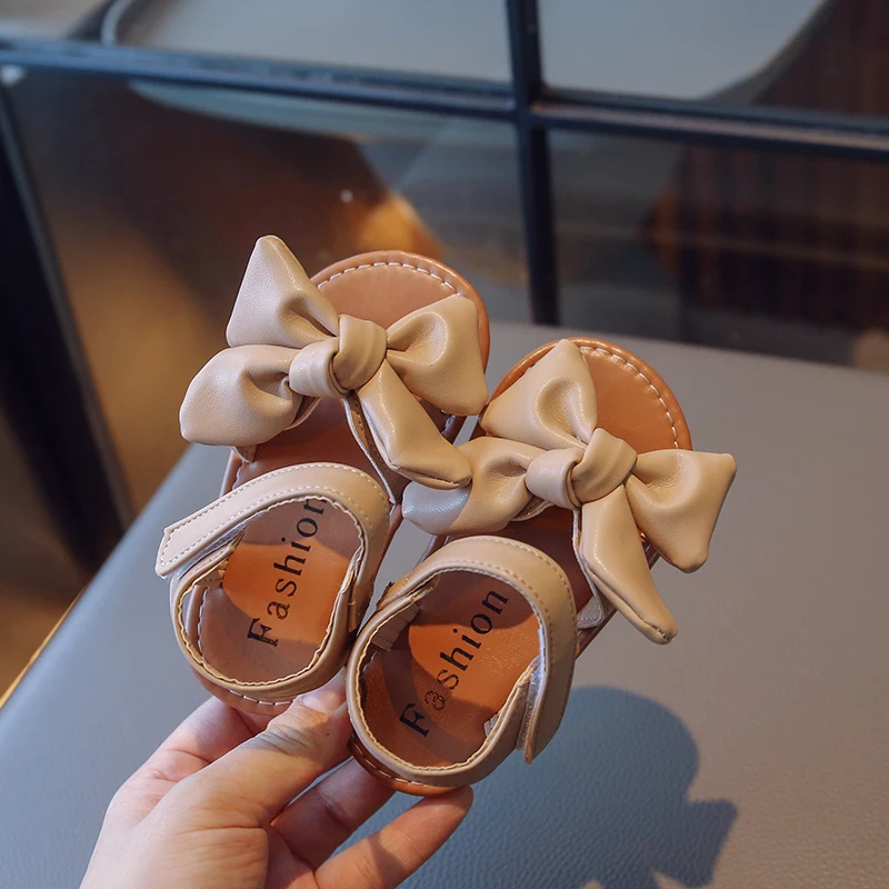 

Summer Girls Hollow Out Flat Sandals Simple Solid Color Kids Princess Open-toe Sandals Baby Children's Beach Sandals with Bow
