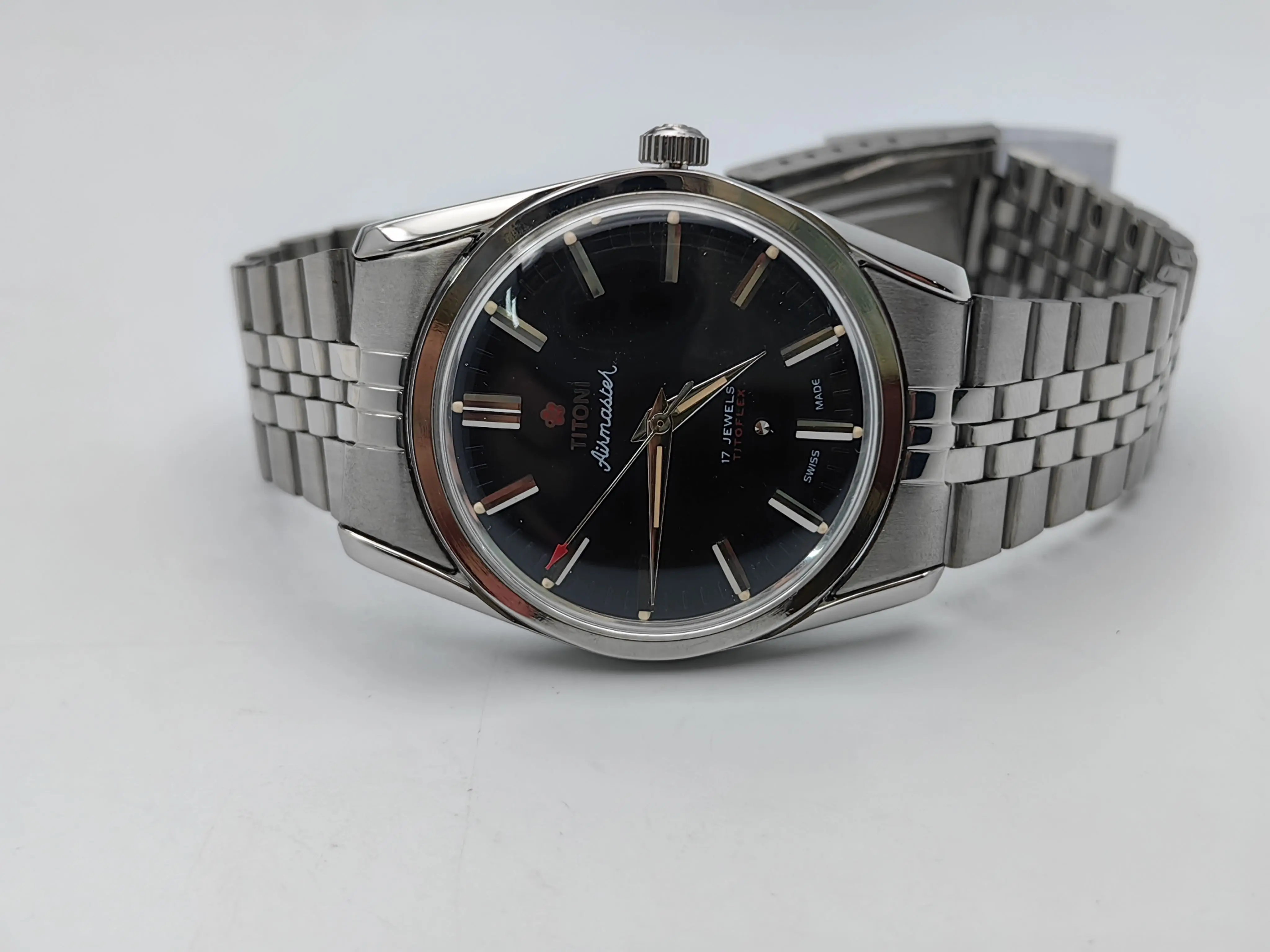 

2750 movement watch manual upper 70s black plate flat plate steel case resin mirror 34 refurbished