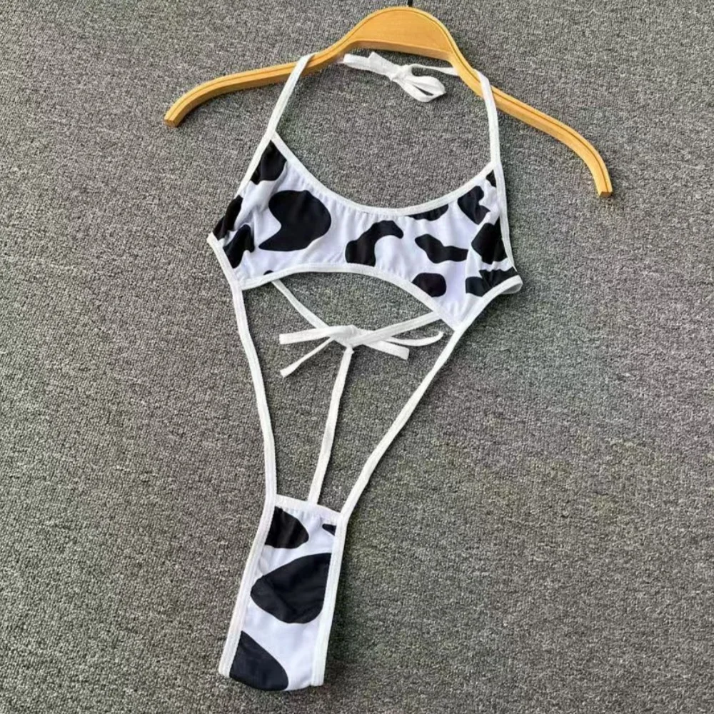 Mono sin mangas con cuello Halter para mujer, mono Sexy con contraste en blanco y negro de vaca, lencería erótica sin espalda con cordones huecos