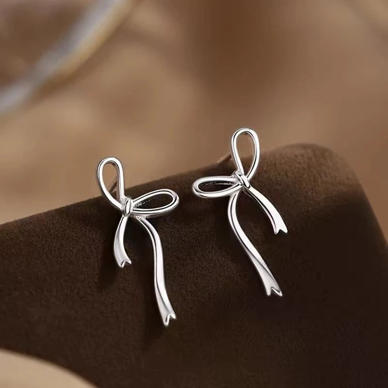 Twinkling Ribbon Bowknot Silver Color Stud Earrings For Women Fashion Long Korean Tender Ladies Jewelry Gifts for Girls