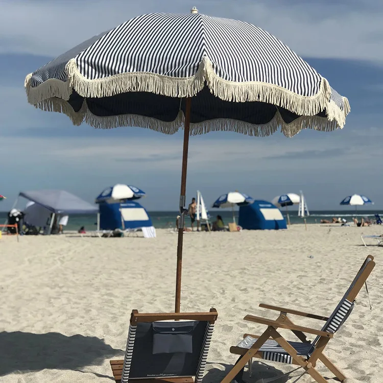 

Outdoor strip beach umbrella can be made of wood mid-bar polyester striped fringed rotating shaft foldable beach leisure