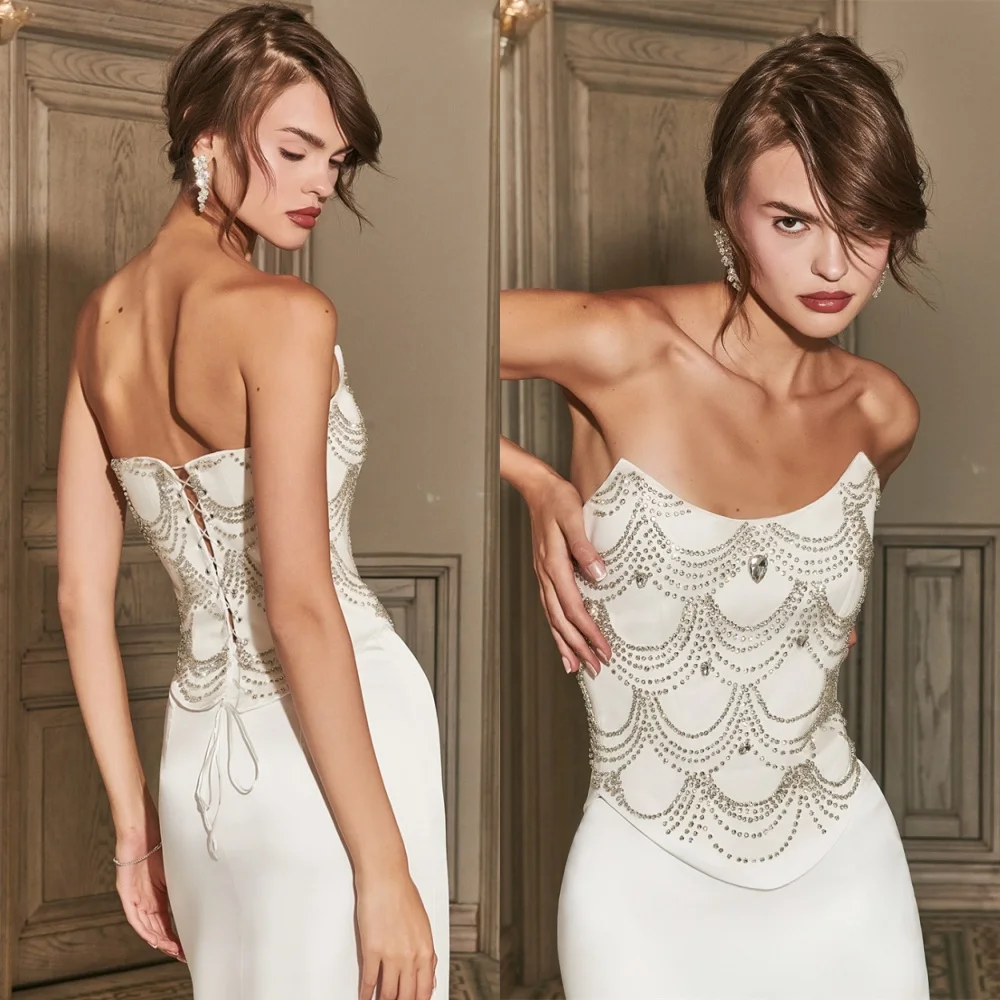 

Простые белые вечерние платья русалки по индивидуальному заказу. Изысканные платья знаменитостей без бретелек без рукавов. Модные платья для особых случаев.