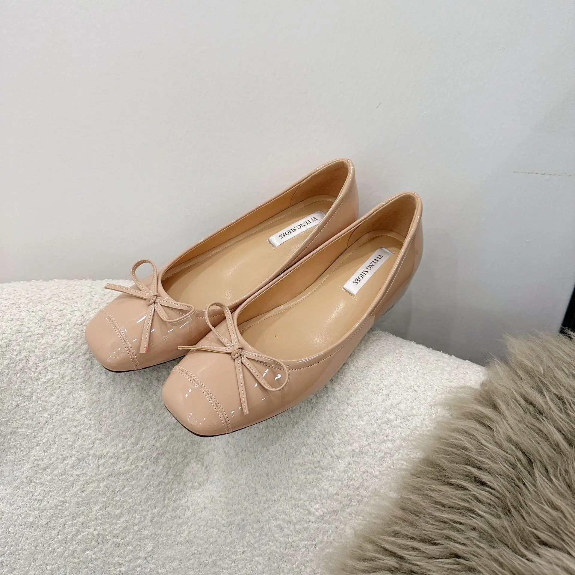 Ondiepe vrouwelijke zachte ronde neus dames flats met schoenen dia's schoenen mode vlinderknoop dames ballet flats dansschoenen