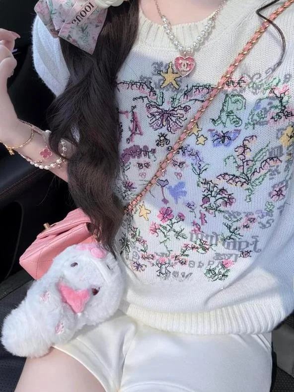 

Женский летний топ свободного кроя с цветочной вышивкой, легкий трикотажный топ с высоким воротом, модный, стройнящий силуэт