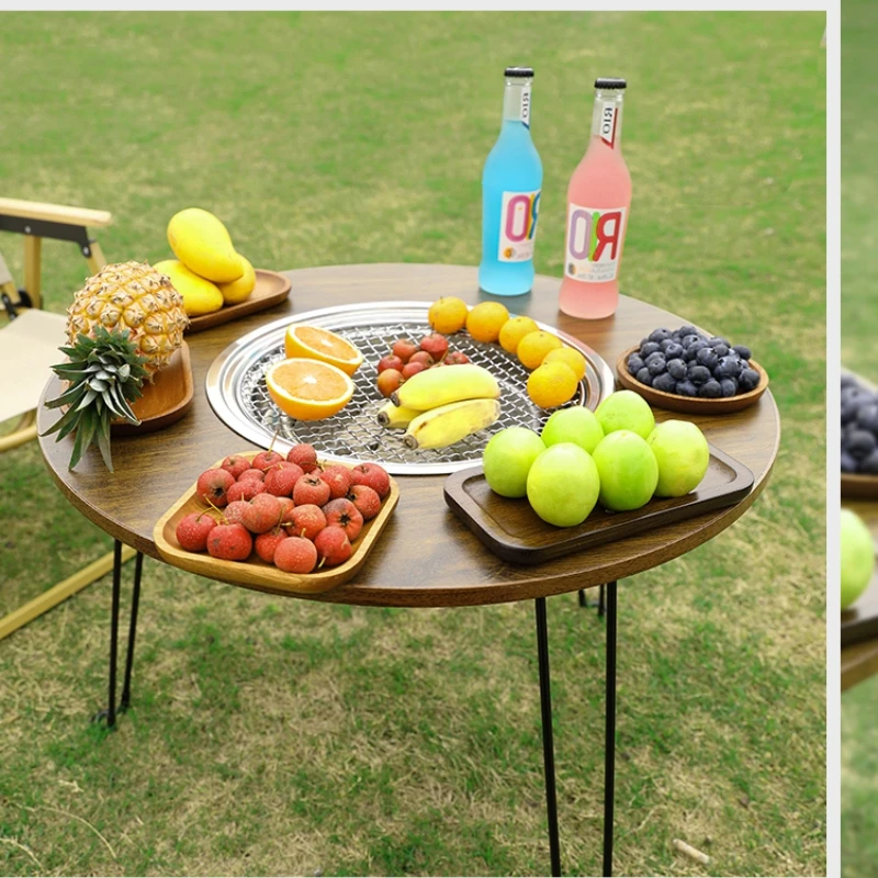 barbecue at home, portable folding barbecue table, charcoal barbecue, barbecue meat, outdoor patio around the stove, making tea