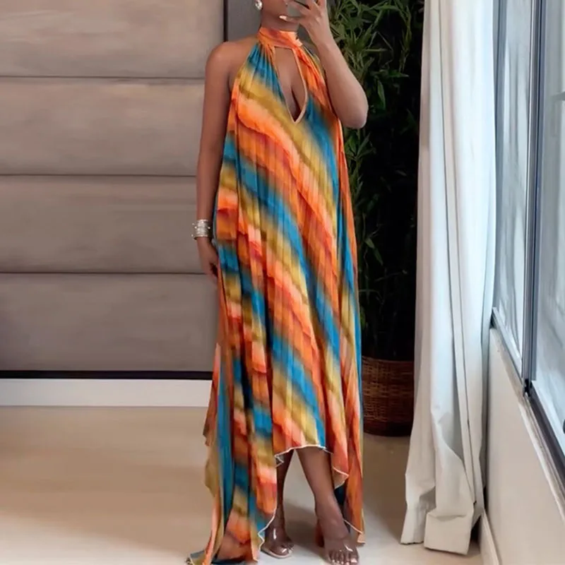 

Элегантное женское макси-платье без спинки с завязками, вырезами, ярким принтом, асимметричным подолом, без рукавов, с завышенной талией, свободного кроя