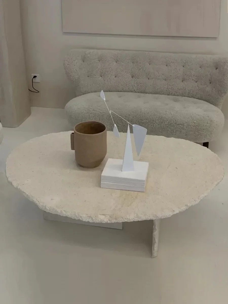 

Nordic simple yellow cave stone coffee table small apartment designer light luxury living room minimalist oval table
