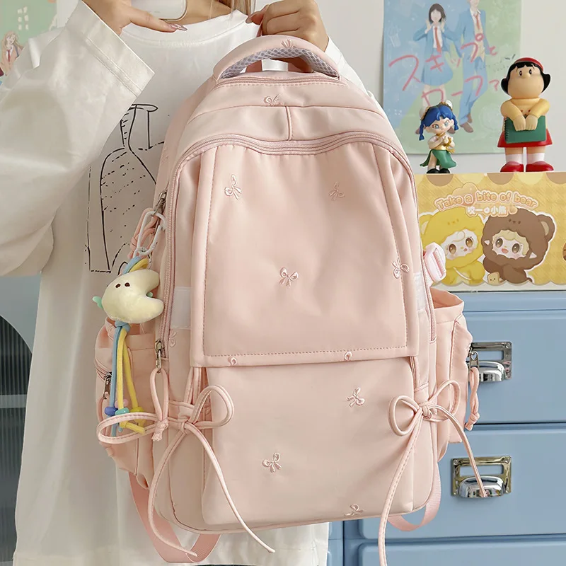 zaino-traveasy-2026-nuovo-per-ragazze-con-fiocco-decorativo-e-ricamo-grande-capacita-in-nylon-con-ciondolo-peluche-borsa-per-campus-e-pendolarismo