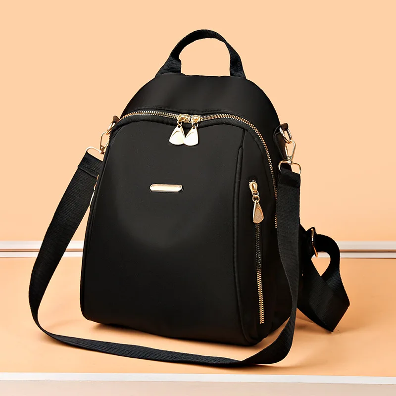 A stylish new women's backpack with a high-end feel, a casual outdoor travel small backpack and a fashionable commuting hand bag