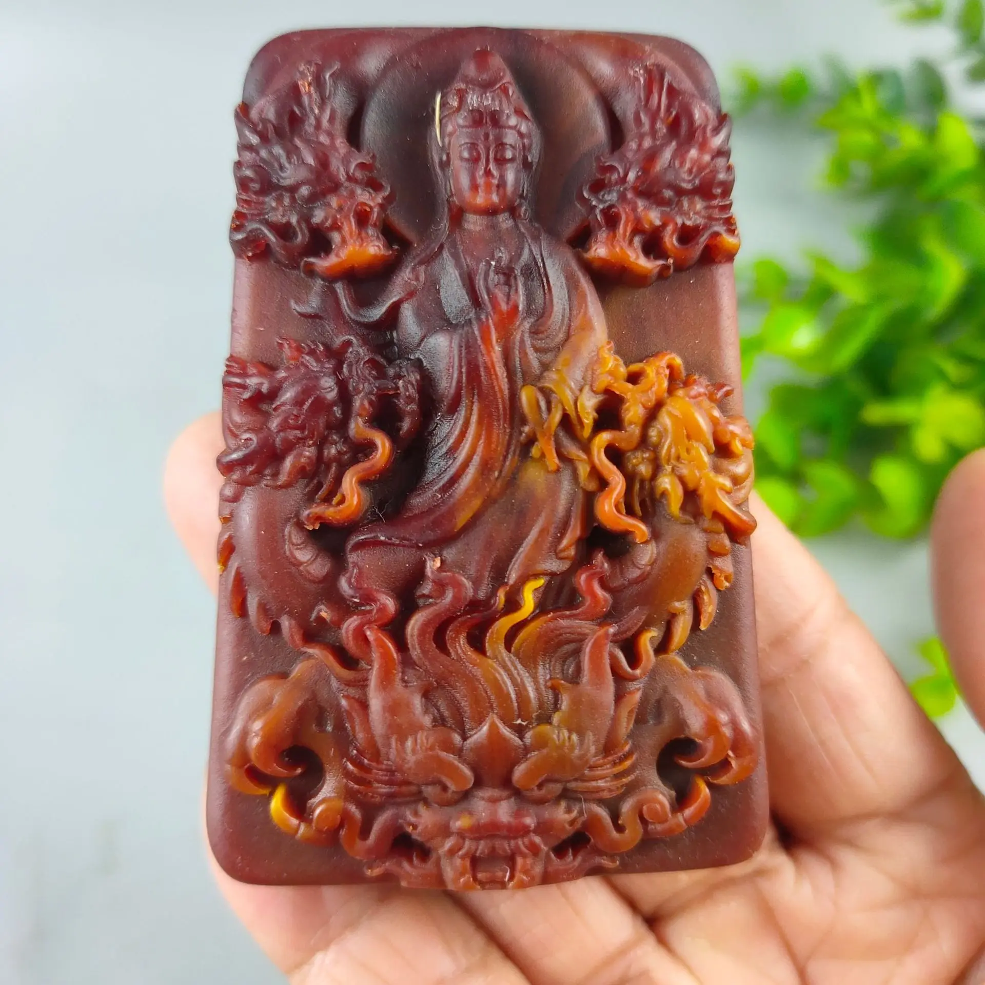 

Chinese Antique Resin Imitation Amber Two-sided Carved Guanyin Bodhisattva Pendant Crafts