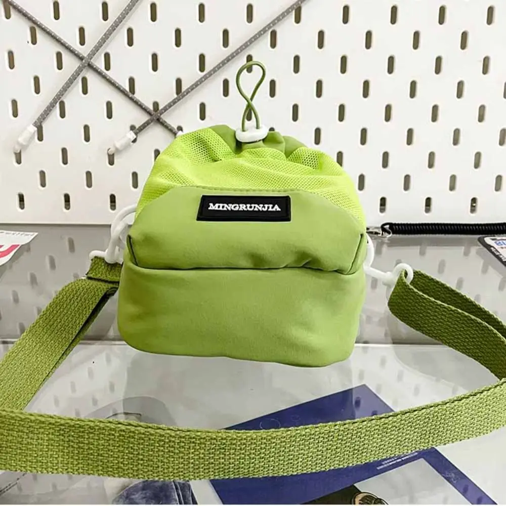 กระเป๋าใส่ขวดน้ำแบบสะพายไหล่ ตาข่าย ไนลอน มีช่องด้านหน้า สายสะพายข้าง พร้อมหูหิ้ว พกพาสะดวก