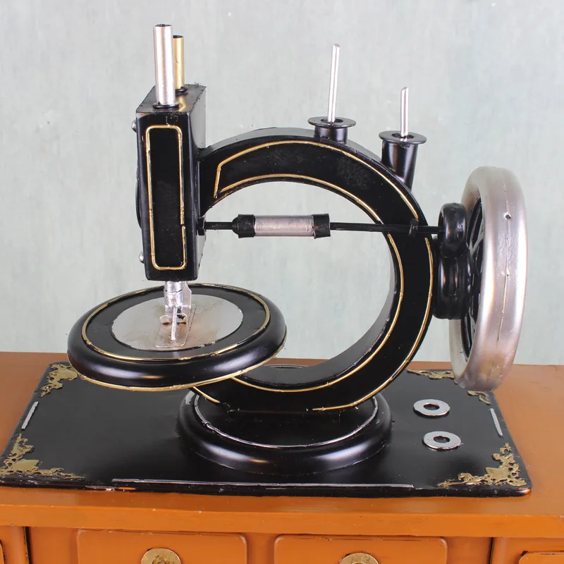 Retro nostalgic old-fashioned sewing machine model, clothing store window props, creative ornaments of wrought iron handicrafts