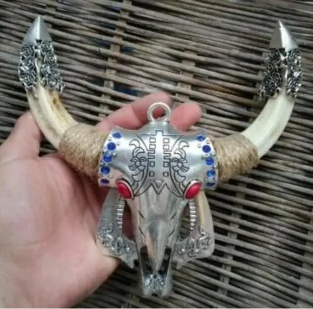 

Wild Pig Teeth Embedded Alloy Ox Head Wild Boar Tooth Amulet Pendant