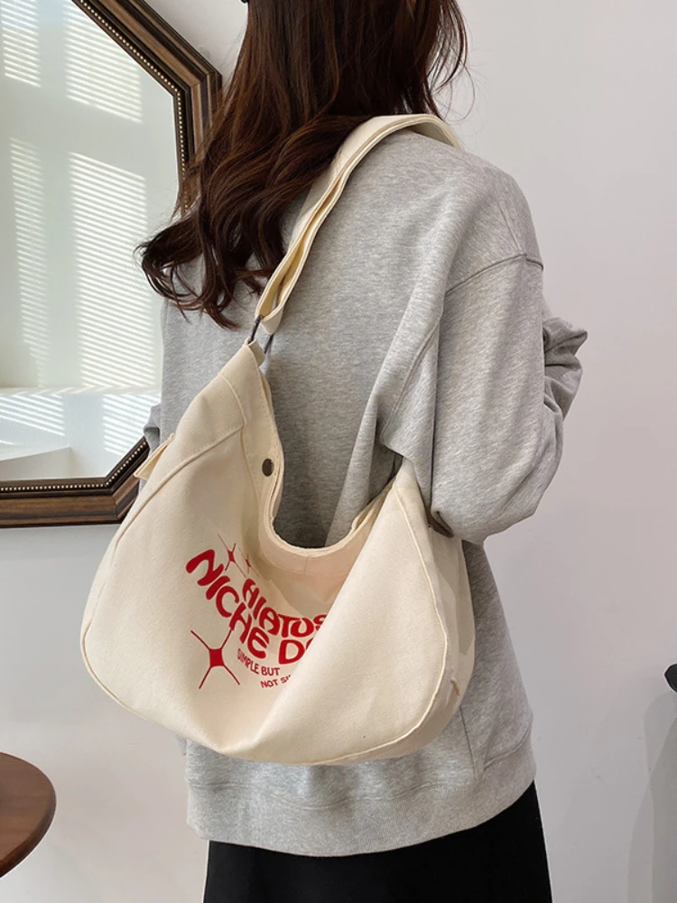 Borsa in tela di grande capacità bianca Beige per donna borsa per gnocchi versione stampa lettera per borsa a tracolla coreana femminile a buon