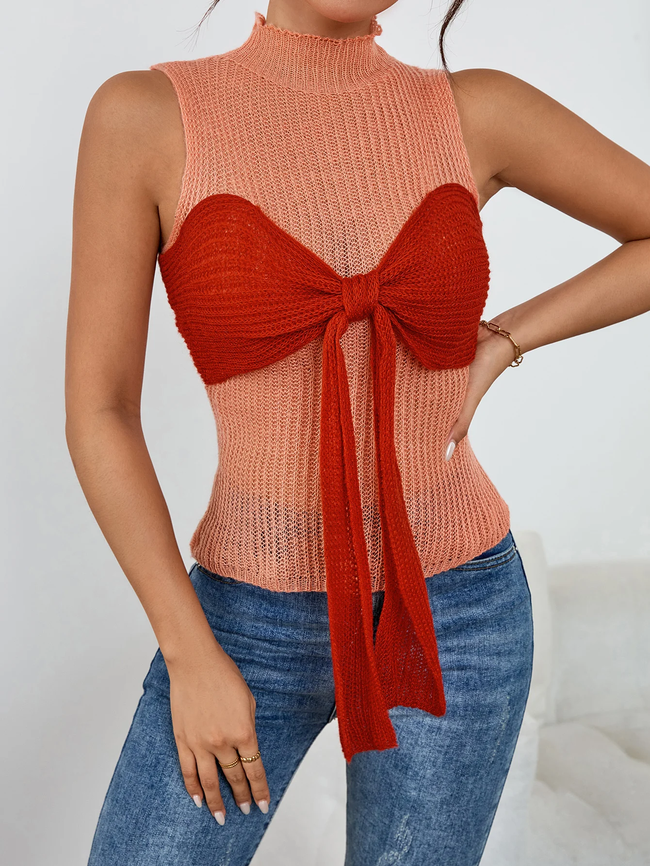 

Europe and the United States in early autumn gentle design bow thin knit vest female hollow-out micro through Spice girl blouse