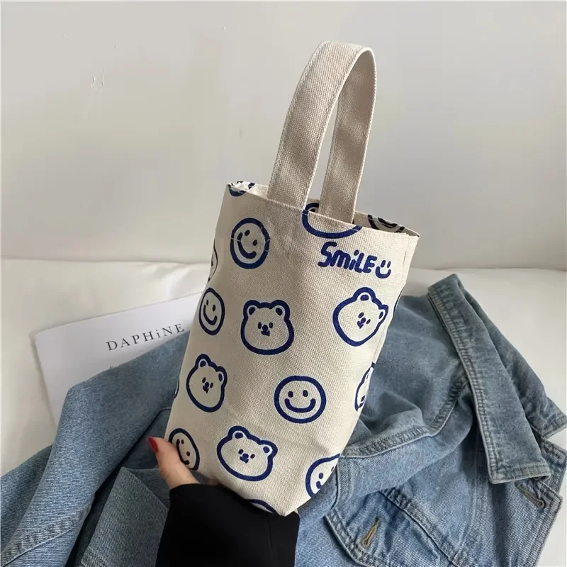 This Cute Floral-Cherry Pattern Tote Bag Is Perfect for Everyday Use and Can Hold a Water Bottle. image 3