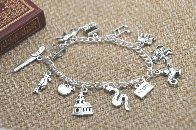 

12pcs Aladdin Inspired Bracelet Tiger Scissors Treasure Chest Music Note Elephant Monkey Magic Lamp Charm