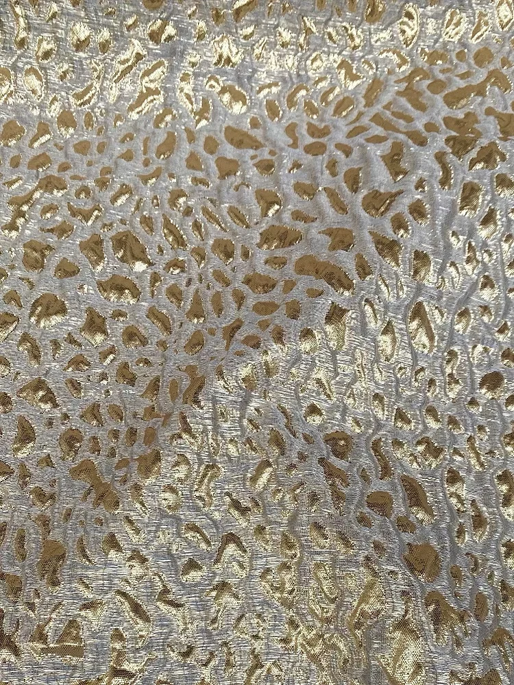 

Рельефная жаккардовая ткань с золотым леопардовым принтом. Материал для шитья. Ткань для одежды Cheongsam. 145 см. Продается ярдами.