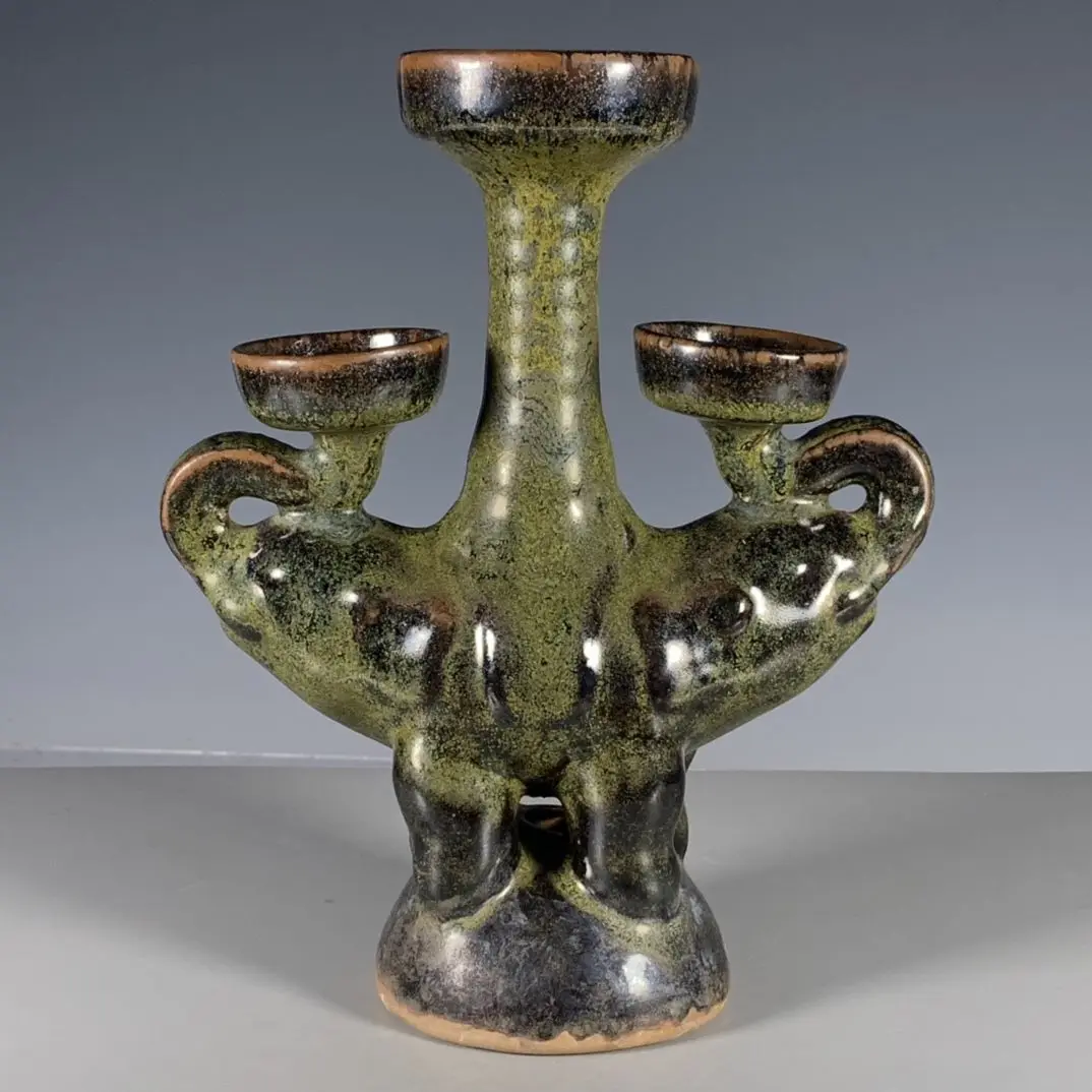 

Chinese style antique tea-leaf glaze elephant-shaped oil lamp collection. Can be used as a candle holder