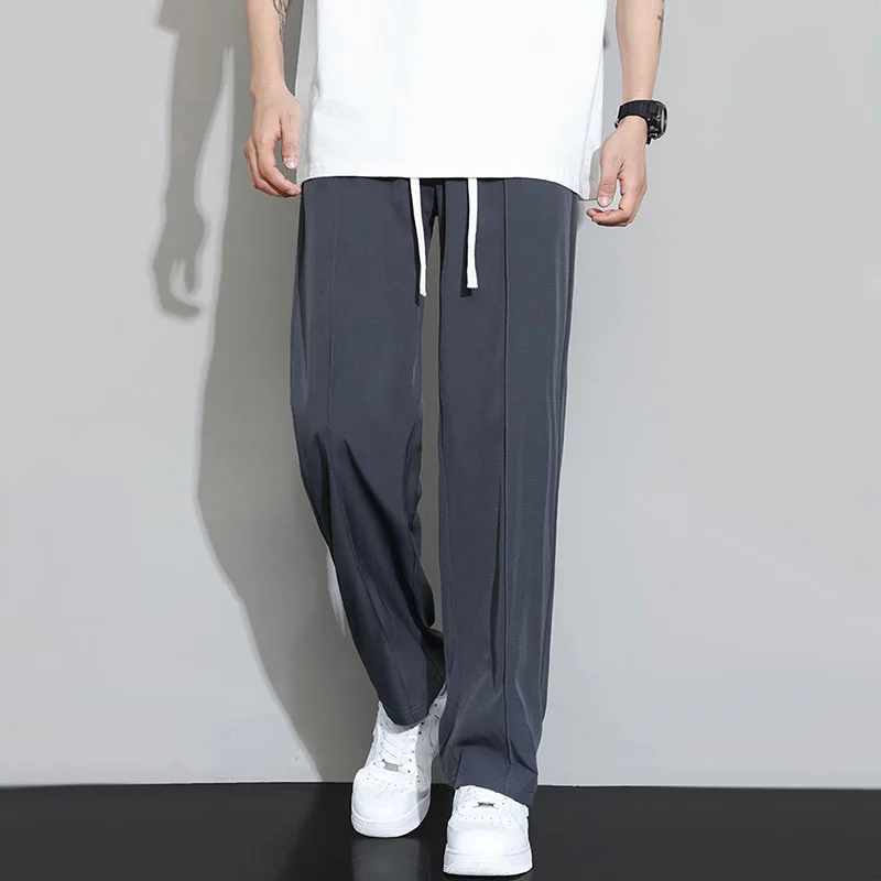Calça casual de seda de gelo masculina, calça masculina fina e respirável, calça reta de perna larga, corredores elásticos, primavera, verão, 2021