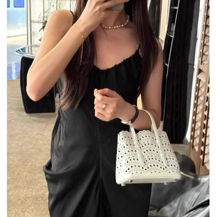 

Vintage Style Genuine Leather Handbag Women's Shoulder Bag with Soft Texture Strap Hollow out Design Bucket Shape Chinese Brand