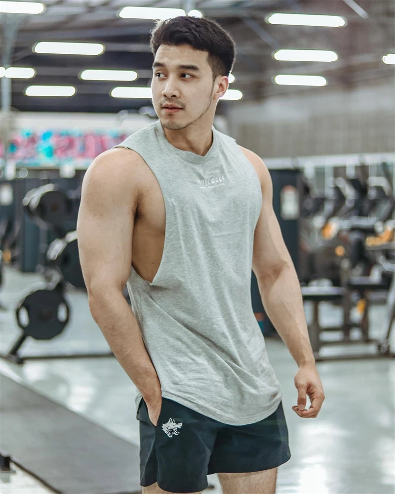 Camiseta deportiva sin mangas con dobladillo curvo para hombre, ropa informal de entrenamiento para gimnasio, chaleco de culturismo, camisetas de Fitness musculosas