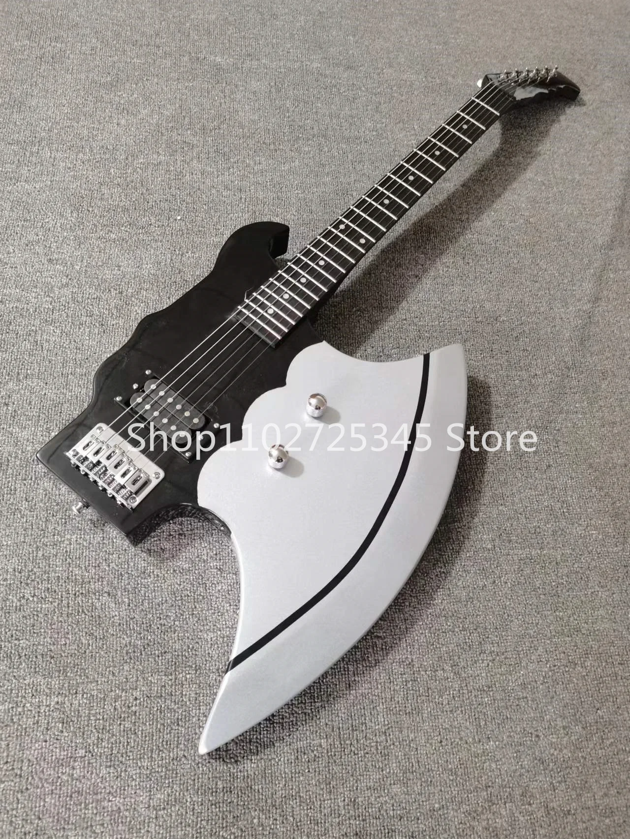 

6-string axe electric guitar, rosewood fingerboard, silver accessories, seller to bear shipping costs