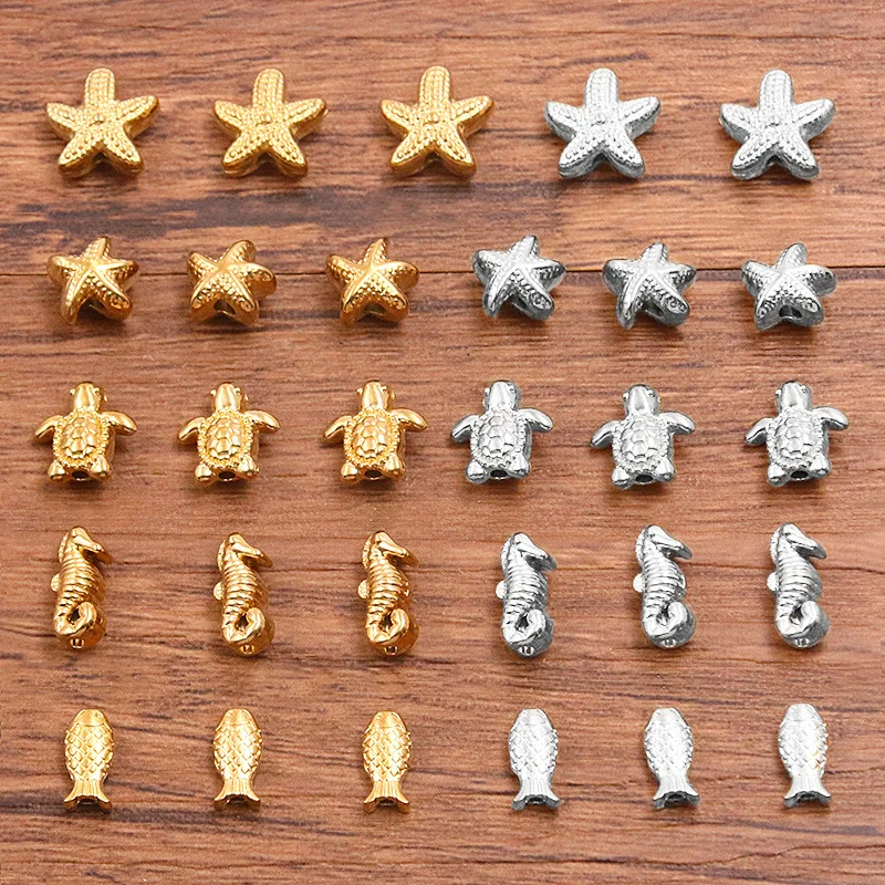 5 Stück Edelstahl-Abstandshalterperlen in Gold mit Seestern-, Fisch-, Schildkröten- und Seepferdchen-Motiv für DIY-Schmuckherstellung von Halsketten und Armbändern. – Detail 2