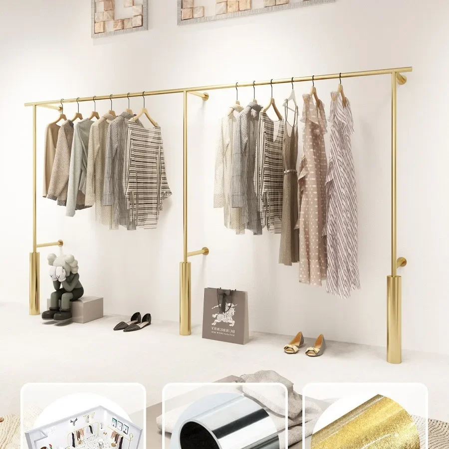 High-end clothing store display shelves, wall-mounted clothes poles, golden women's clothing store display shelves