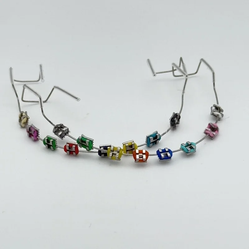 

1 Pair Colorful Brackets Dental Fake Braces For Teeth Temporary Metal Wires Fashionable Metal Bracket Orthodontic Ligature Ties