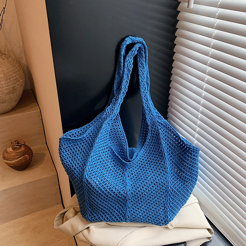 

Large Capacity Shoulder Bags Commuting Hollow Out Fabric Solid Color Portable Female Bags on Sale 2025 New Women's Handbags