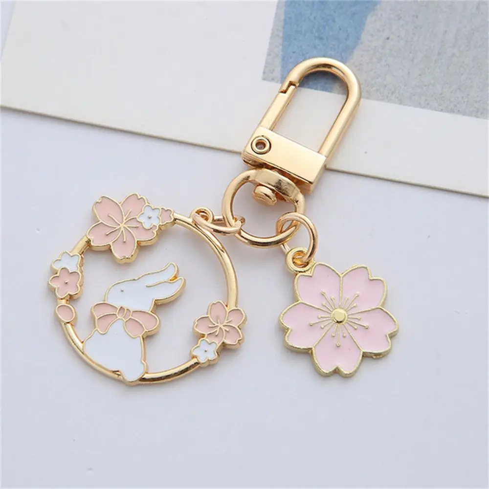 

Cute Round Rabbit Cat Metal Keychain Lovely Pink Sakura Car Bag Keyring Girl Boy Couple Jewelry Lanyard Headset Pendant