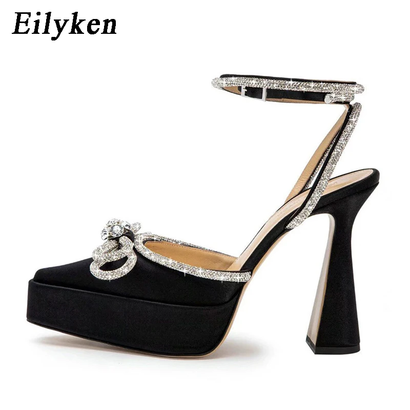 Eilyken-salto alto estilo pista para mulheres, nó borboleta de cristal, dedo apontado, sapatos volumosos de plataforma, sapatos de festa e baile, marca de moda