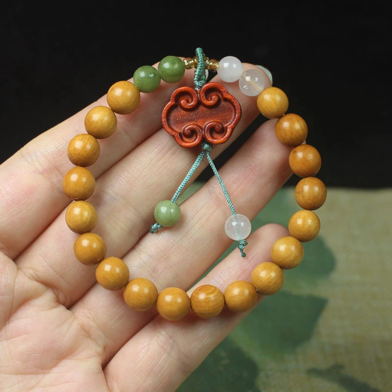 

Женский браслет из сандалового дерева 8 мм с подвеской Руи, в лесном стиле, с молитвенными бусинами и буддийскими украшениями из бусин.