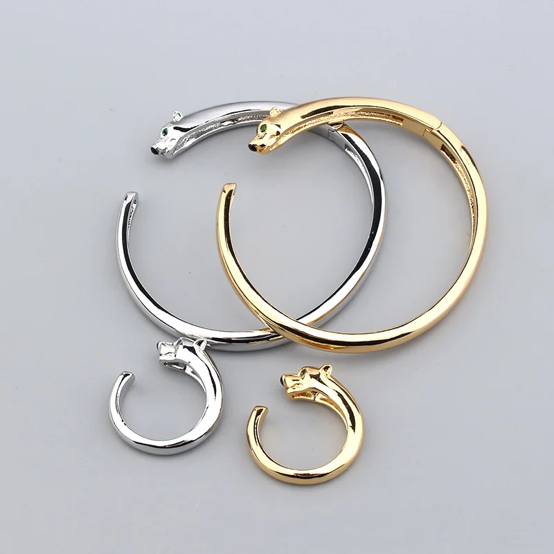 أوروبا أمريكا الاسلوب المناسب الرجال النساء سيدة مطلي الذهب اللون البطانة مكعب الزركون الأخضر عيون ليوبارد حلقة مفتوحة سوار