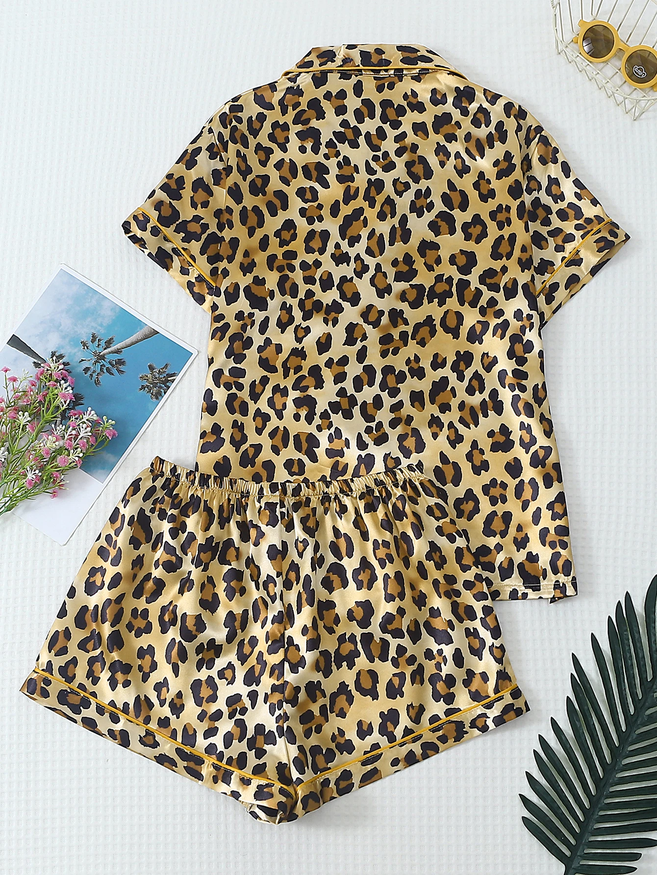 Two-Piece Comfortable Satin Leopard Print Lapel Button-Down Short-Sleeve Top with Pockets and Bow Shorts Spring/Summer Women's Pajama Loungewear Set Suitable for Home Use