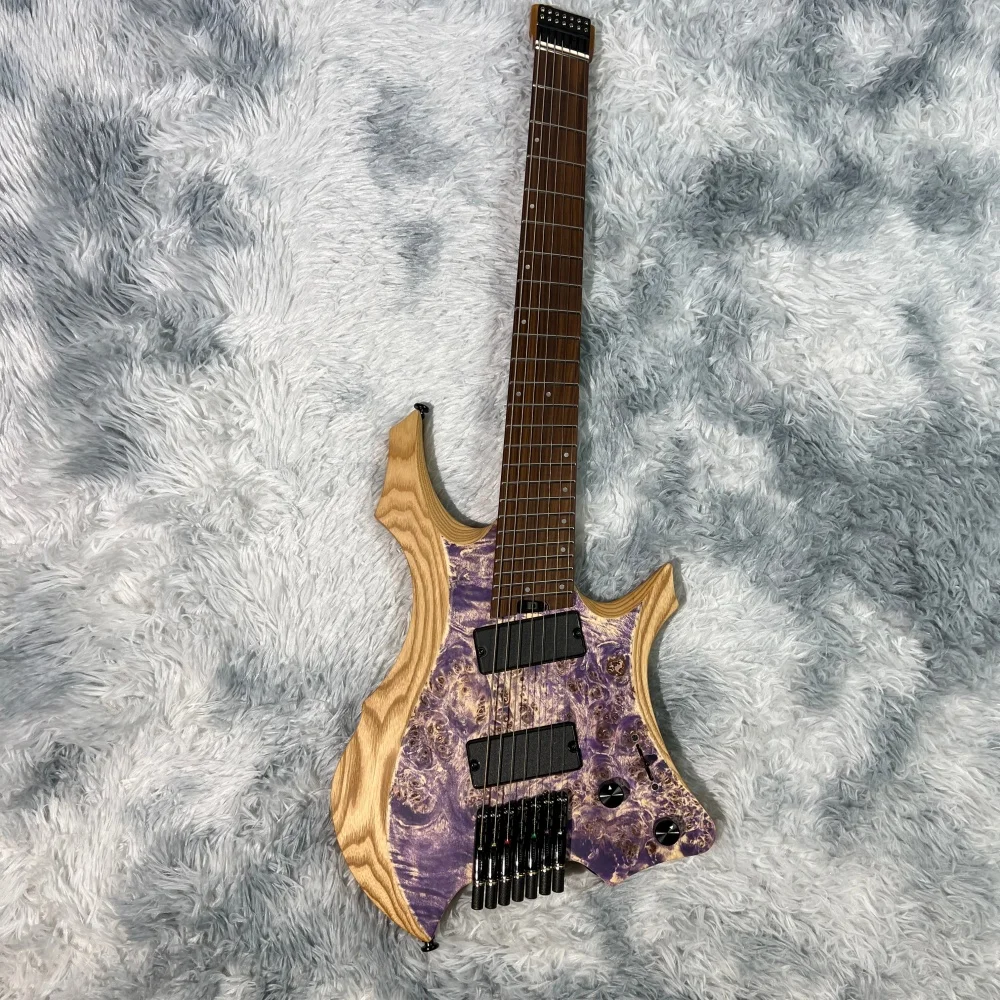 7-string headless electric guitar, 24 frets, fan frets, bone nut, active pickups, titanium alloy string locks, stainless frets,