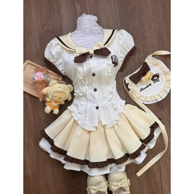 Conjunto de falda estilo japonés dulce Lolita para mujer, camisa con lazo y cuello de marinero Kawaii, Falda plisada bonita Y2k con delantal, minifalda, traje