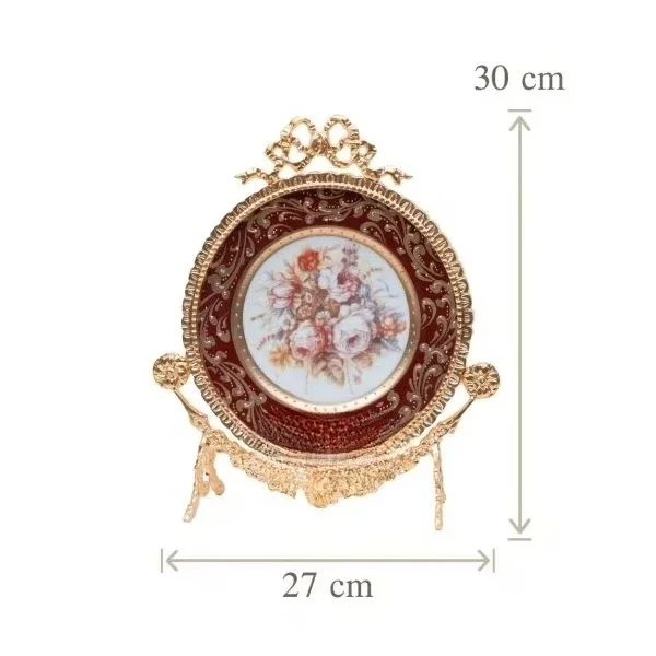 Antique brass and porcelain trim set with floral painted vases and ornate plates with vintage-inspired designs
