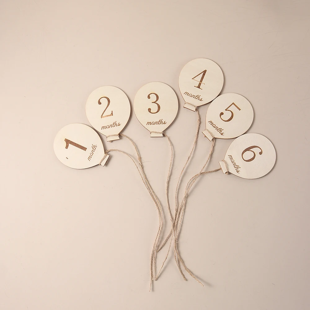 การ์ดเหตุการณ์สําคัญทารกรายเดือนไม้ 12 ชิ้น - อุปกรณ์ประกอบฉากภาพถ่าย 1-12 เดือนสําหรับการติดตามการเจริญเติบโตของทารกแรกเกิด (รูปทรงบอลลูน)