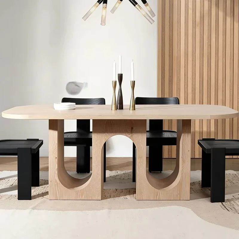 

Dining table with plywood base, with carved U-shaped cutouts and light wood finishes, suitable for modern spaces