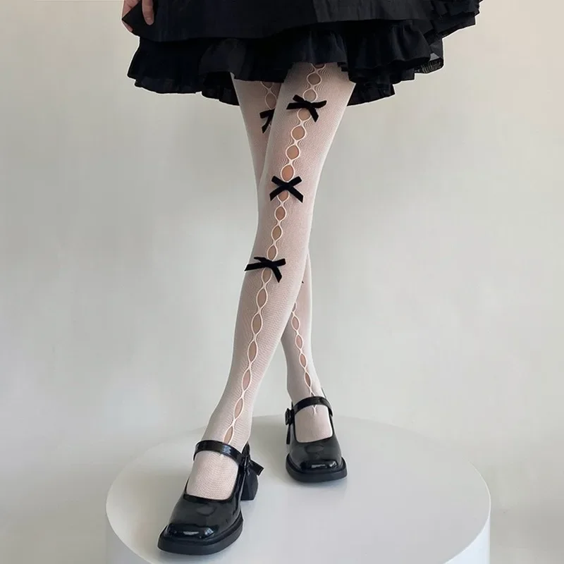 Lolita fille filet de pêche dentelle collants nœud papillon évider collants Sexy mince Ins marée collants Anime chaussettes noir blanc bas
