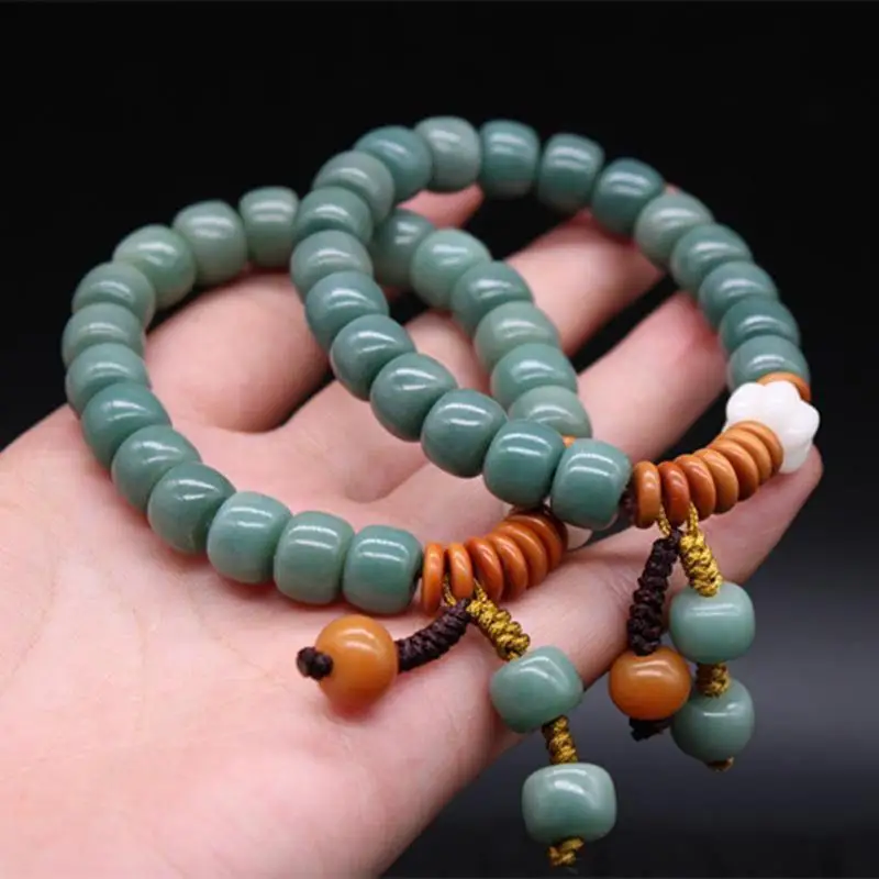 Weiße Jade Bodhi Wurzel biegsames Temperament Yin Leder Gradient Buddha Perlen Armband Handwerk Männer und Frauen feve