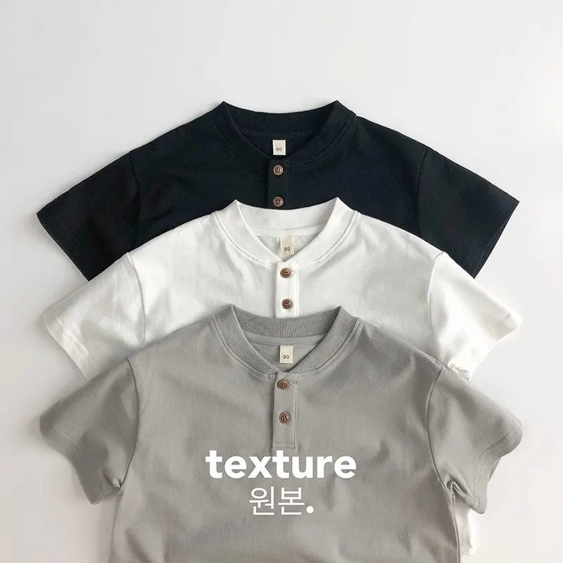 Summer children's T-shirt new Korean version handsome boy and girl baby casual solid color short sleeved T-shirt polo shirt