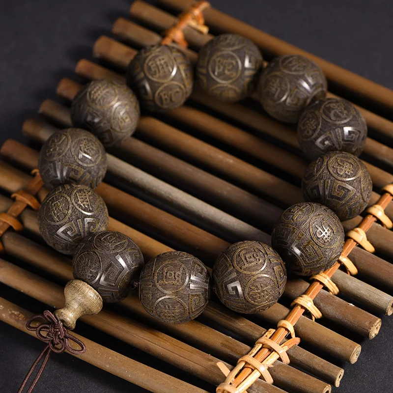 Sichuan golden nanmu dark wood laser-engraved Buddha beads with the image of Amitabha and auspicious clouds, a decorative hand b