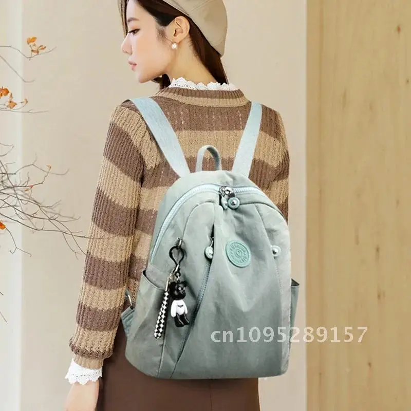 2024 جديد مقاوم للماء حزمة القماش المرأة على ظهره موضة الحقائب المدرسية النايلون في سن المراهقة الظهر حقيبة عالية الجودة الفتيات الكتف للسفر