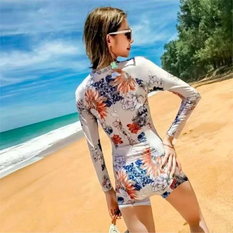 بدلة سباحة قطعة واحدة للتخسيس منقوشة بالزهور لعام 2025 |   واقي من الطفح الجلدي بأكمام طويلة مع ظهر مثلث للحماية من الشمس والغوص